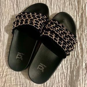 Chained black women’s slides